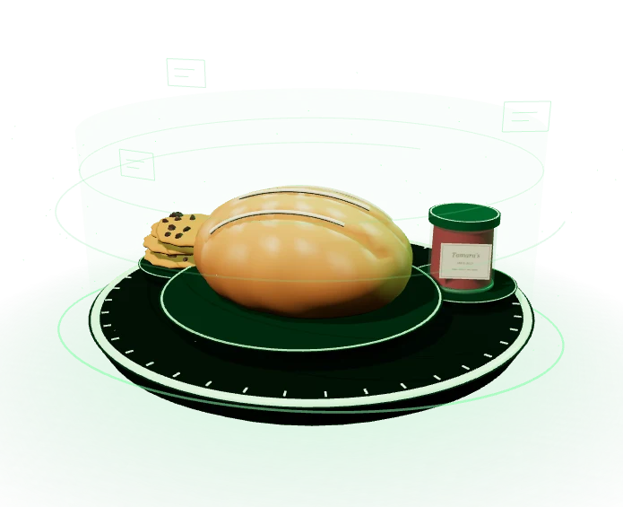 An emerald-lit bakery display with bread, cookies, and jam